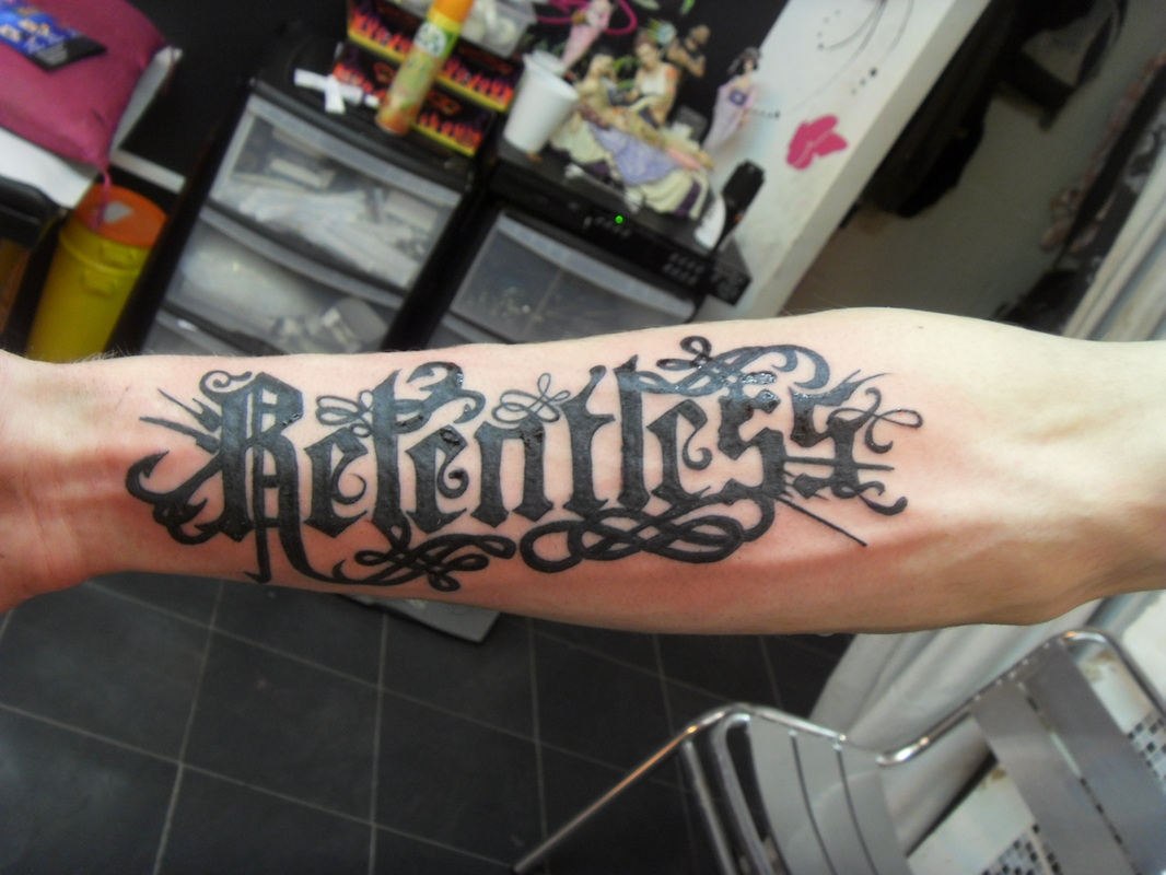 Relentless Army Tattoo On Left Arm